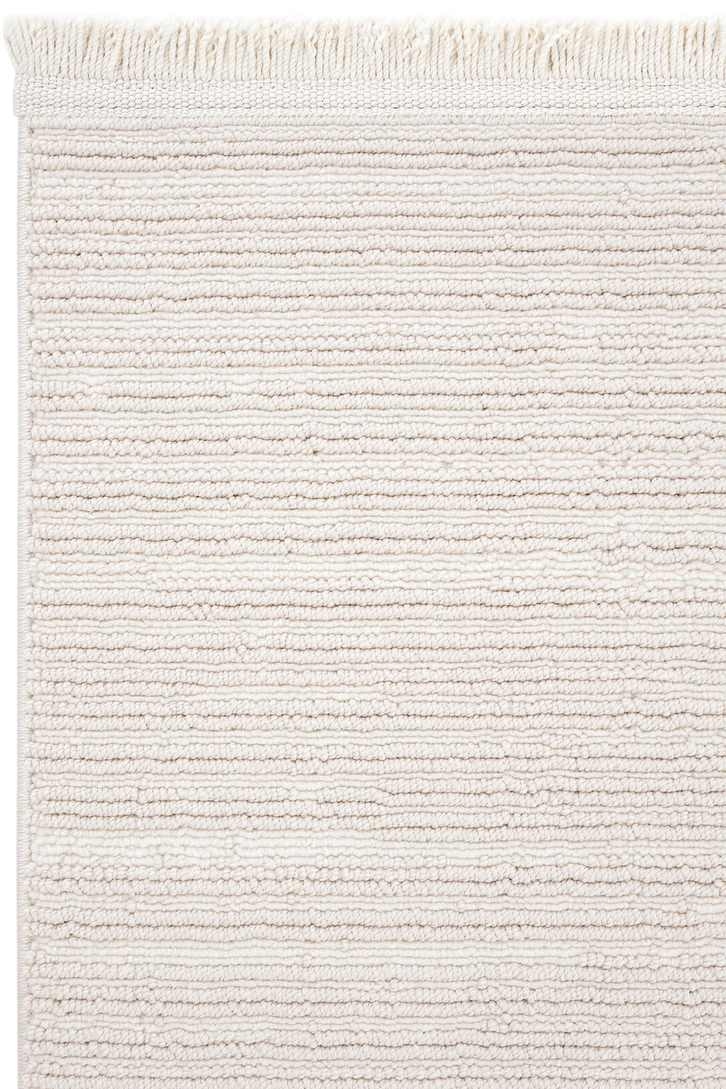 Krem rengi dokulu modern dekoratif halı, kabarık iplik detayları ve püsküllü kenar