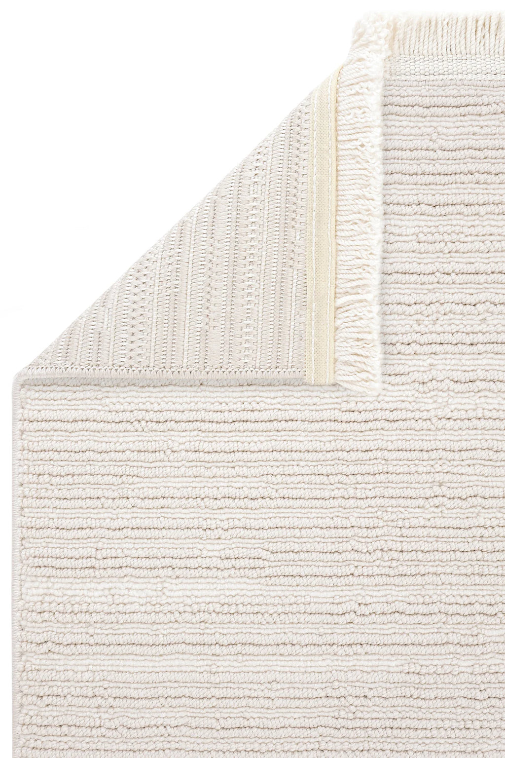 Beyaz dokulu pamuklu el yapımı kilim köşesi detay çekimi