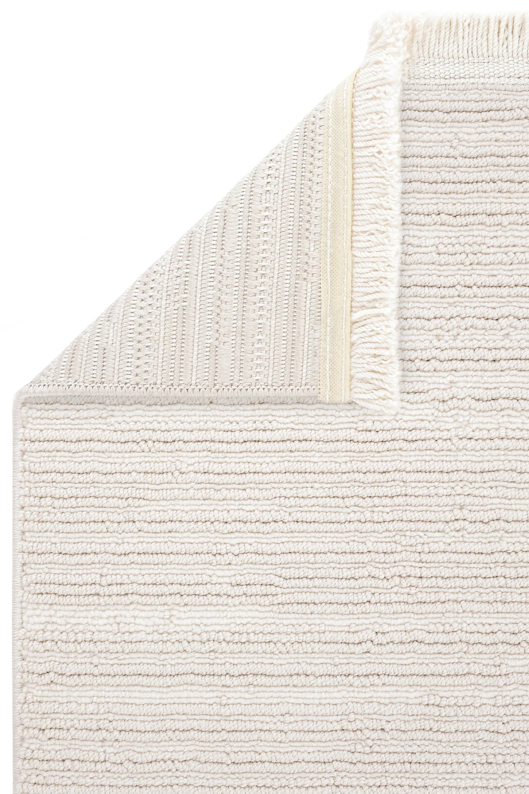 Beyaz dokulu pamuklu el yapımı kilim köşesi detay çekimi