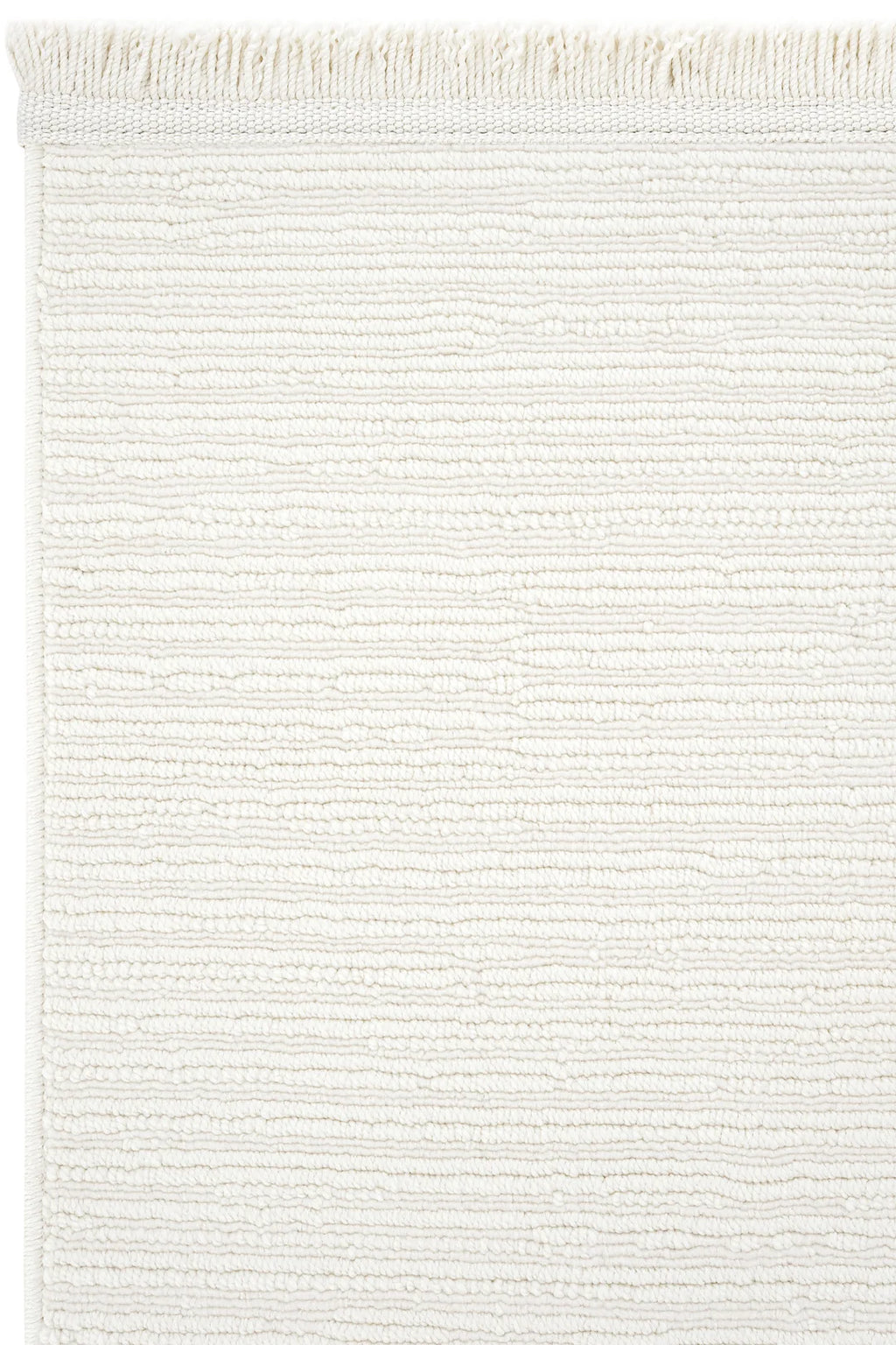 Beyaz renkli dokulu dokuma halı, üst kenarında püsküllü tasarım