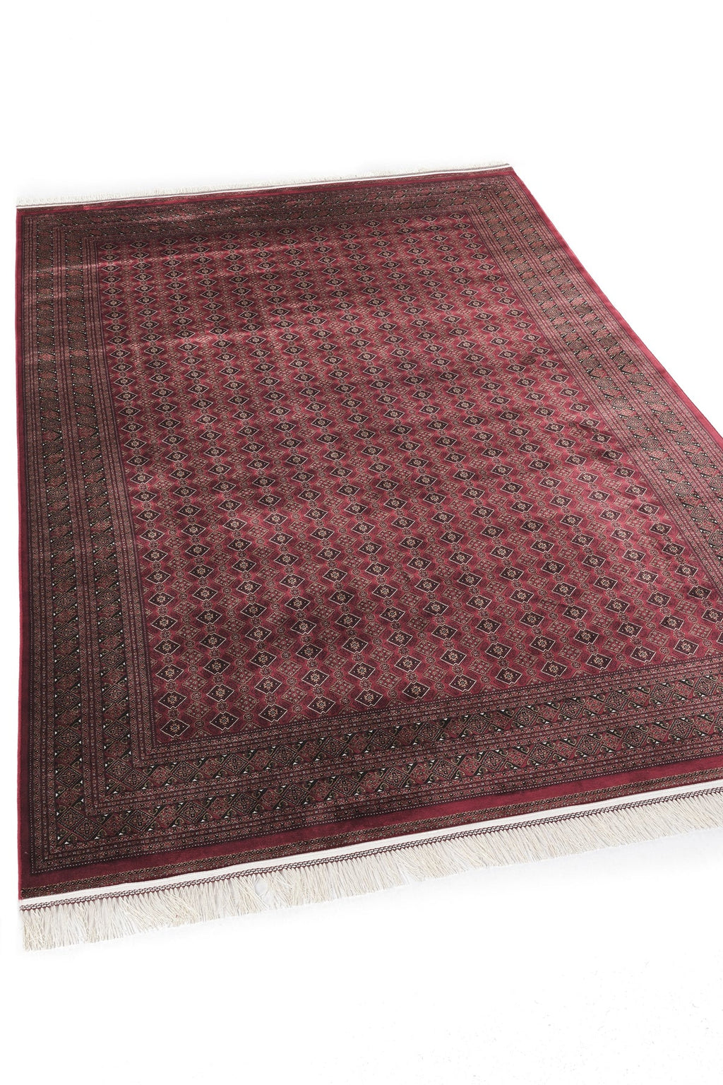 Kırmızı zeminli geometrik desenli, beyaz püsküllü geleneksel halı