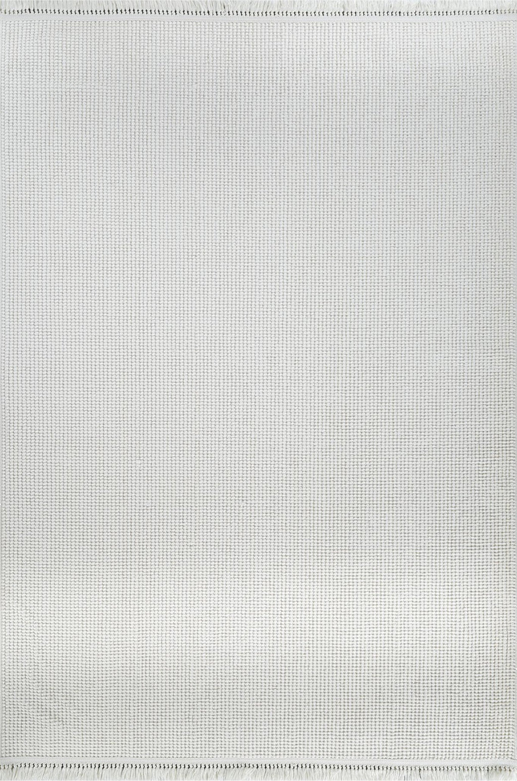 Açık ekru renkli, dokuma görünümlü modern makine halısı, sade tasarımlı çevresi püsküllü