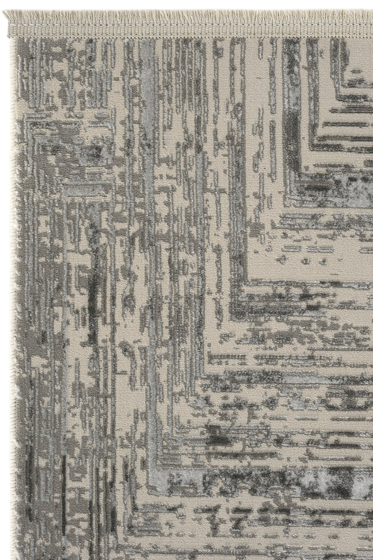 Gri ve krem renklerde modern desenli Luxess Hermes halı kenar detayı